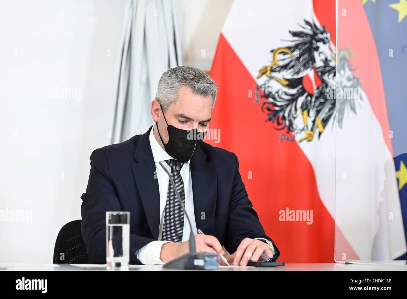 Vienna, Austria. 6th January 2022. Press conference after the consultations on the corona development on Thursday, January 6th, 2022, in the Federal Chancellery in Vienna with Federal Chancellor Karl Nehammer Stock Photo