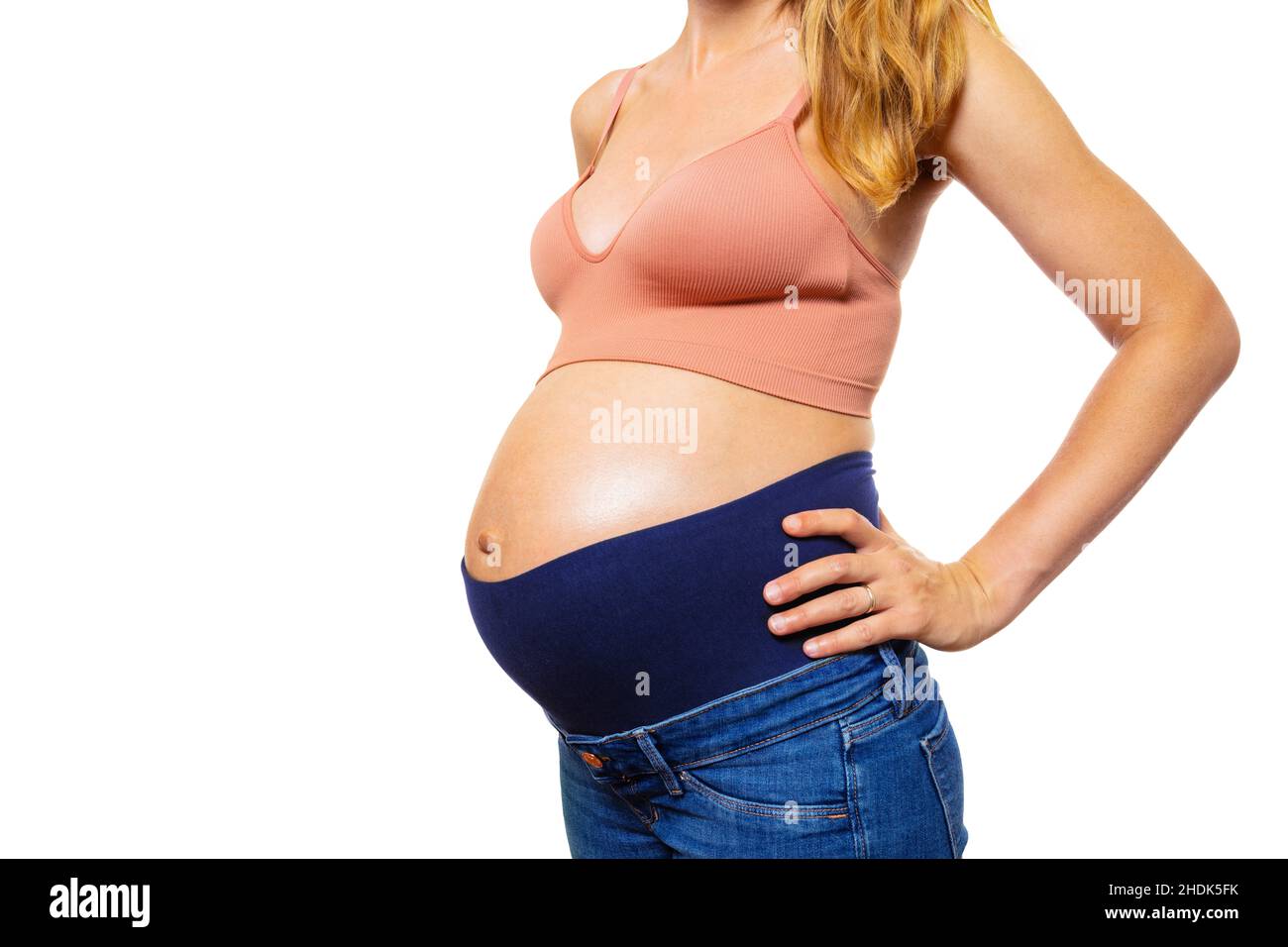 Expecting pregnant woman white pants hi-res stock photography and