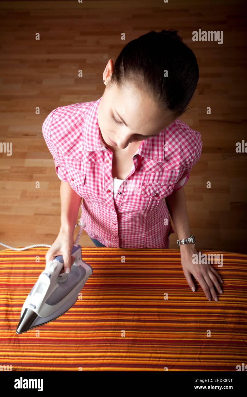 housewife, ironing, ironing work, housewifes, ironing works Stock Photo Alamy