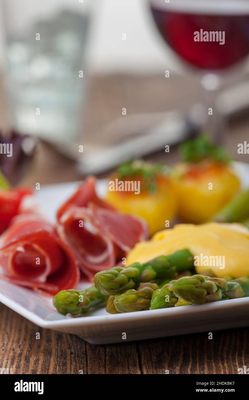 green asparagus, hollandaise, serrano chilli pepper, hollandaises, serrano chilli peppers Stock Photo