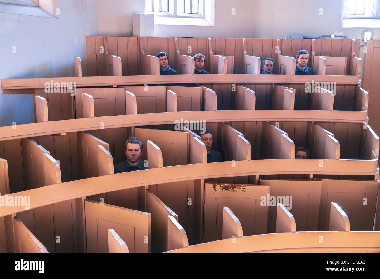 A very old Victorian style court room and also religious gathering room, in the work famous Lincolnshire Prison. Stock Photo