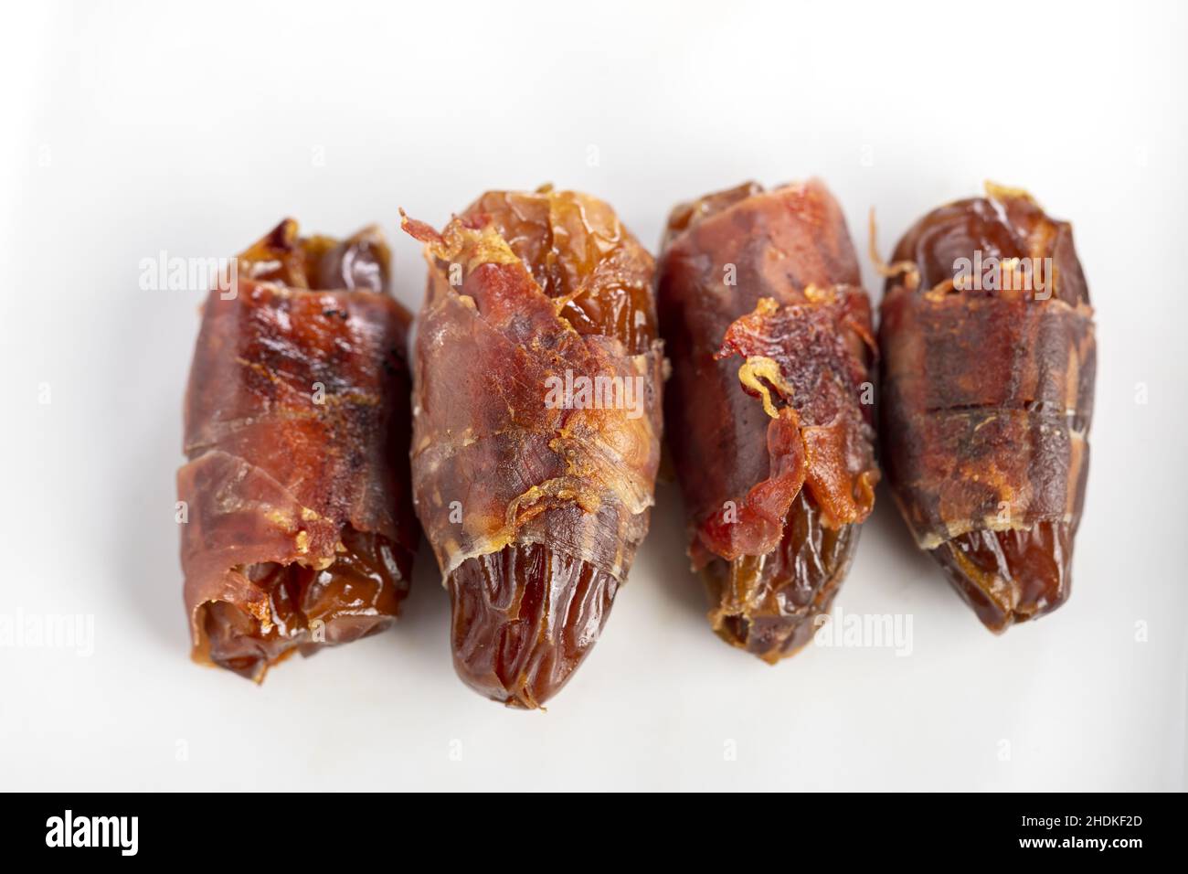 tapas, bacon wrapped dates Stock Photo Alamy