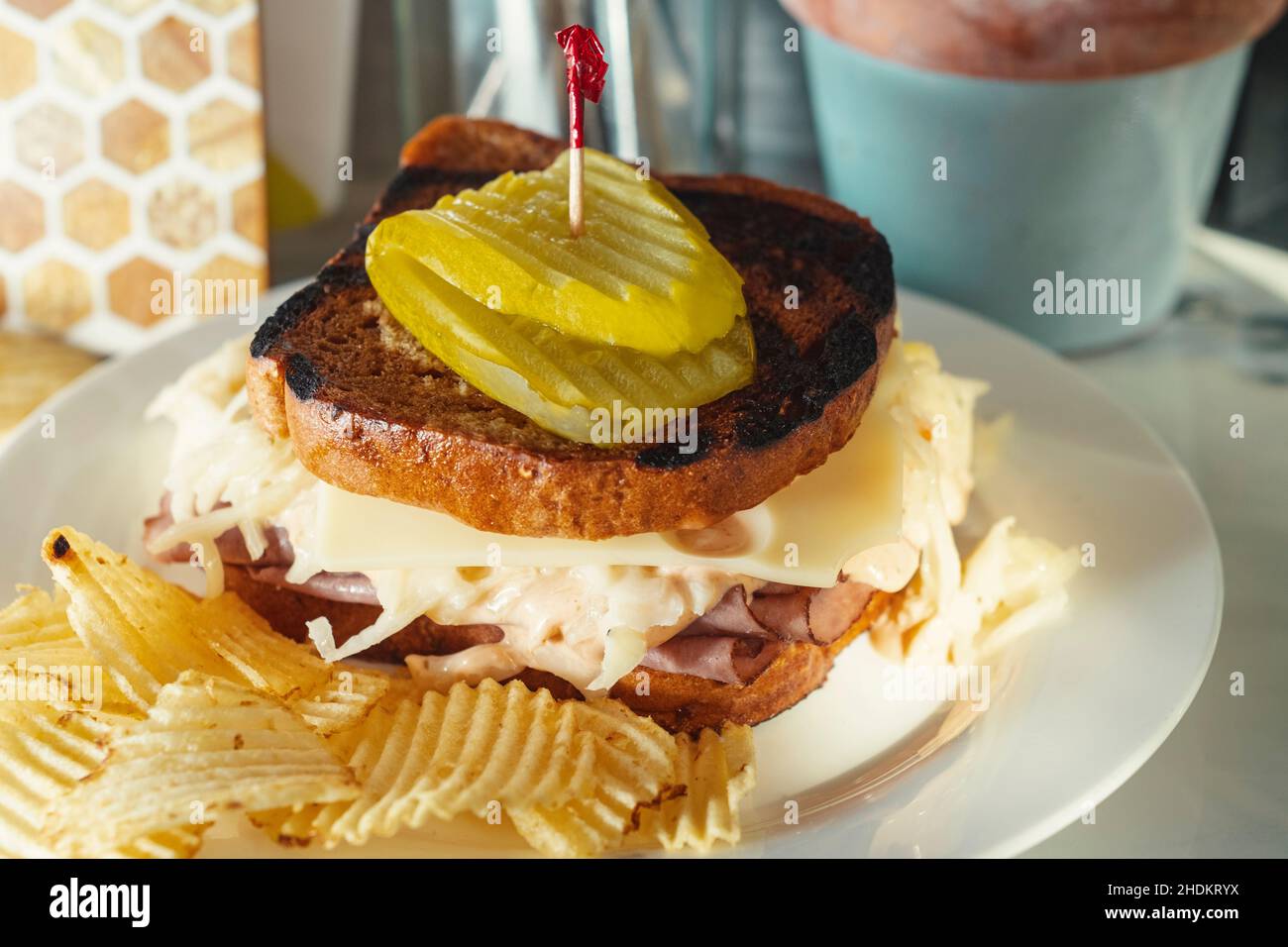 Roast beef and swiss cheese sandwich with cole slaw and dill pickle Stock Photo