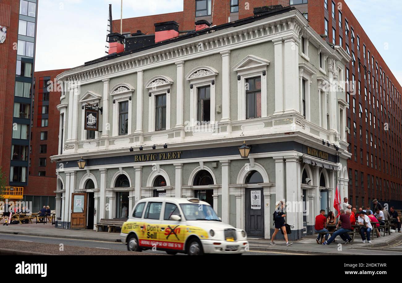 The Baltic Fleet Pub, Wapping, Liverpool 1. Grade 2 listed. Taken on European Cup Final Day May 2018. Taxi passing with 'Don't buy the Sun' Banner. Stock Photo