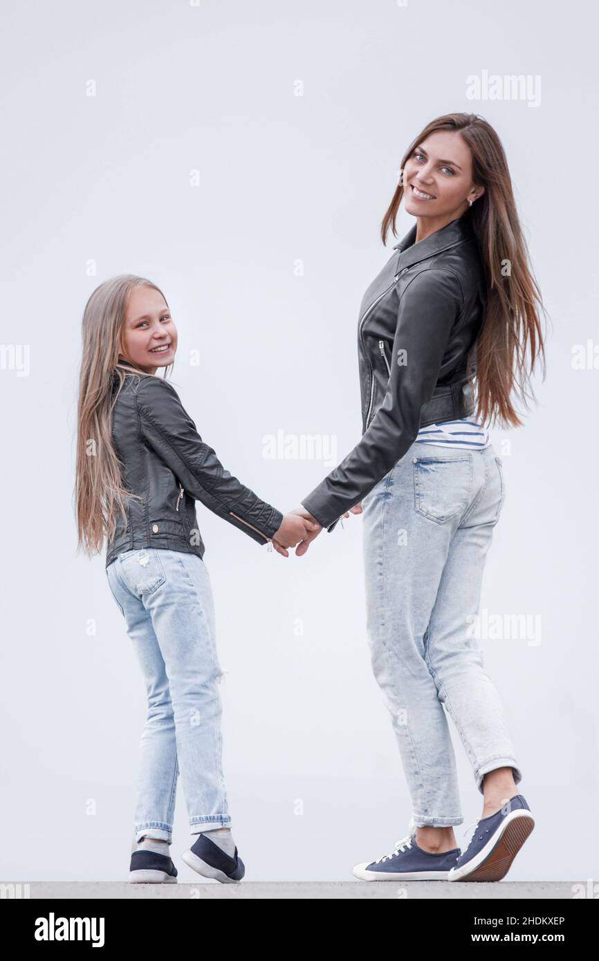 rear view. happy mother and daughter walk together Stock Photo - Alamy