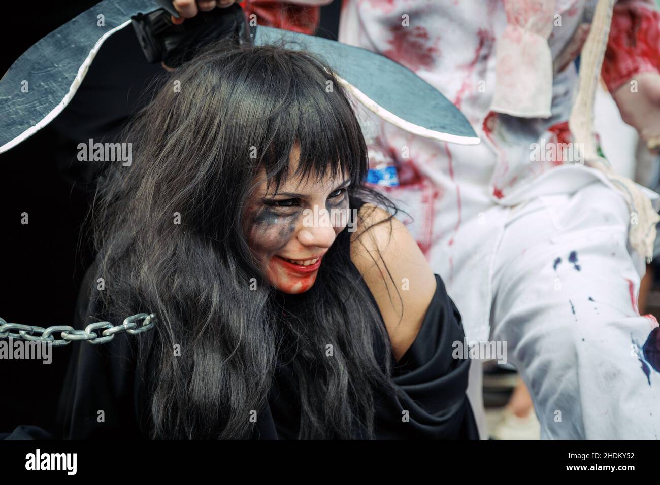 Sao Paulo, Brazil. 2nd November, 2013. A person dressed up as a zombie attends the annual Zombie Walk in Sao Paulo, Brazil. Stock Photo