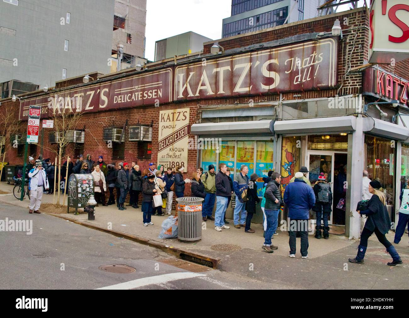 Outside of World famous Katz's Deli, located on the lower east side of Manhattan, NYC, USA. Crowd lines up to get in. Stock Photo