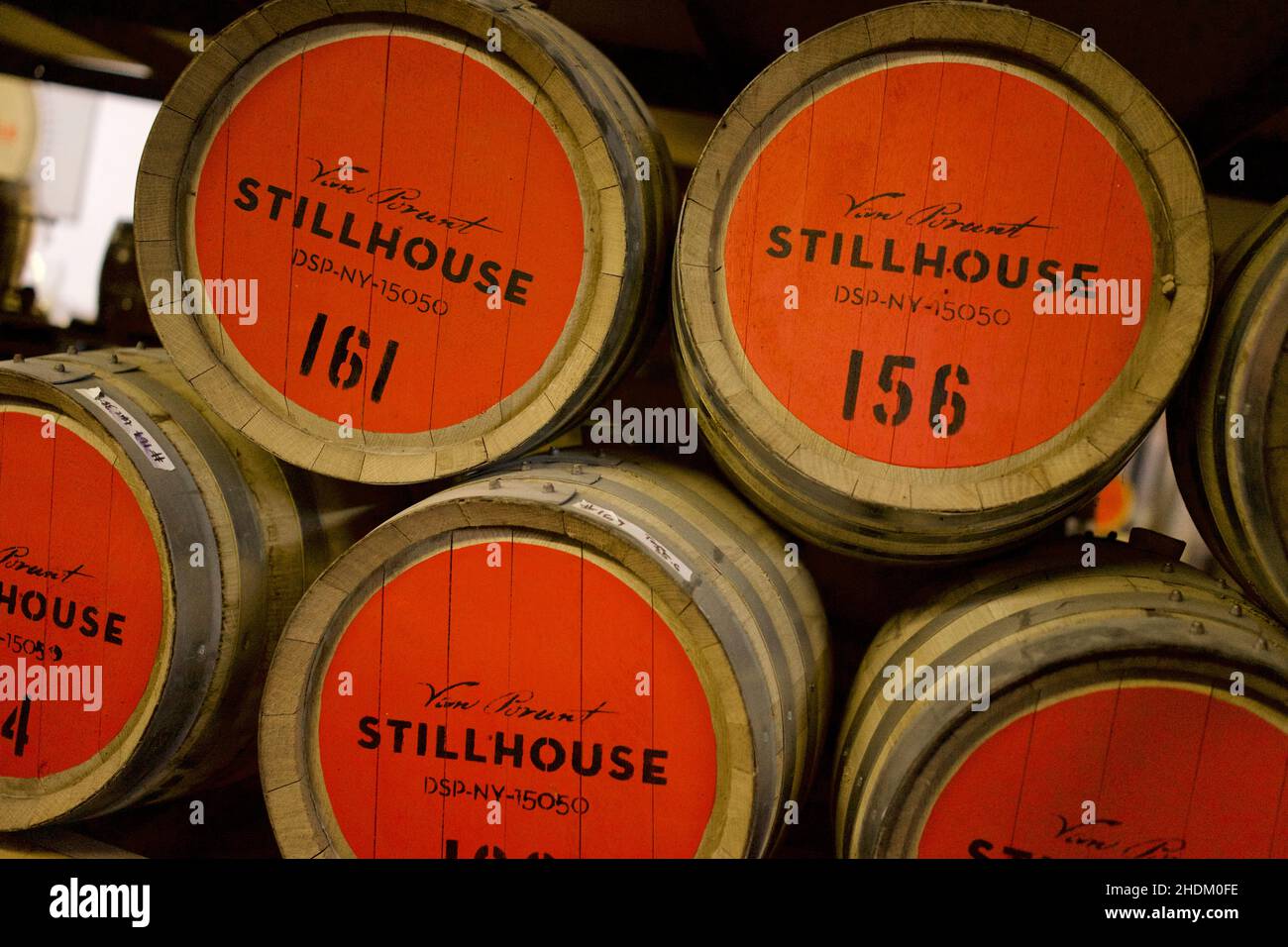 Wooden barrels at Van Brunt Stillhouse is a New York State Farm Distillery in the heart of Red Hook Brooklyn, New York City, NY, USA Stock Photo
