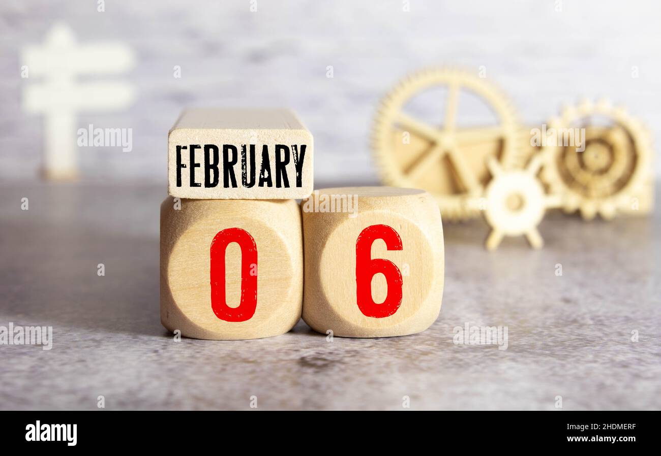 Vintage photo, February 6th. Date of 6 February on wooden cube calendar, copy space for text on board Stock Photo