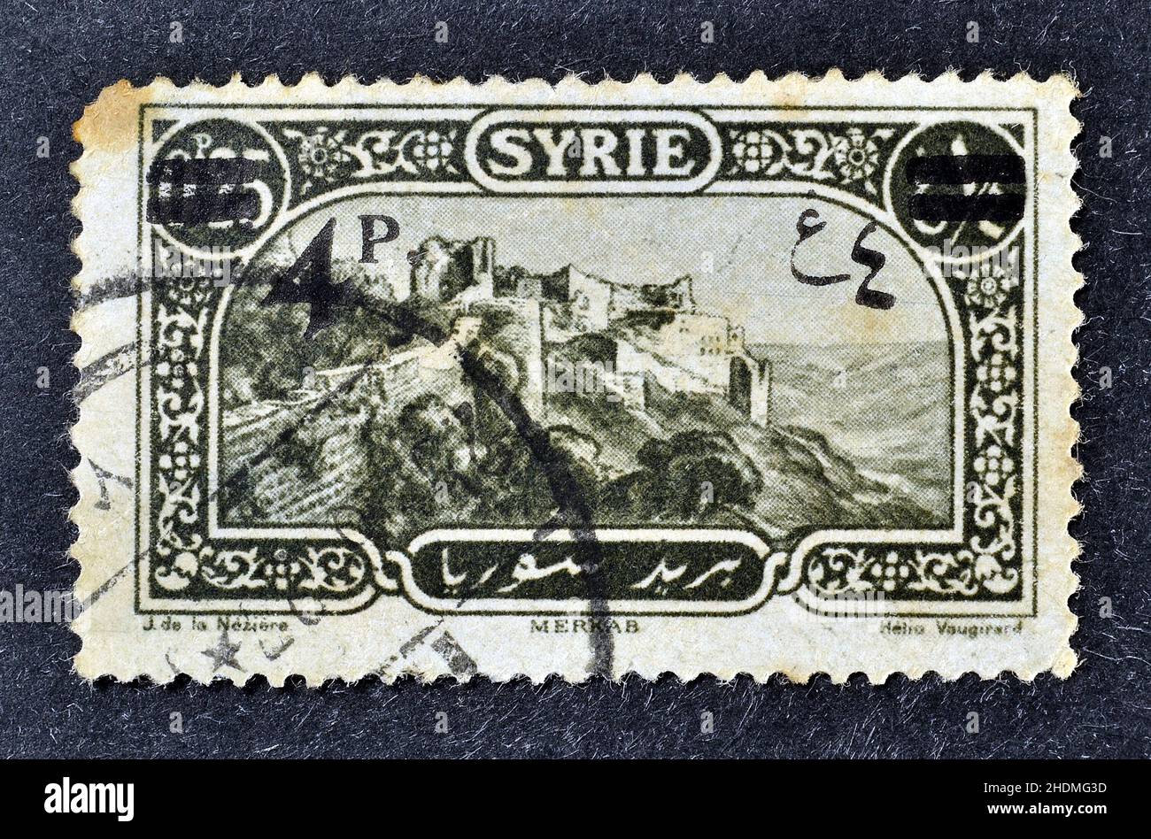 Cancelled postage stamp printed by Syria, that shows View of Merkaba, overprinted, circa 1925. Stock Photo