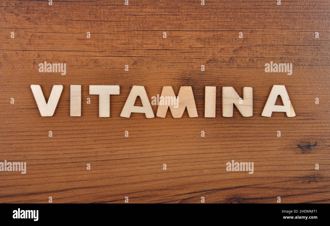 Vitamin Lettering vitamin a, wooden letters, vitamin as, wooden letter Stock Photo - Alamy