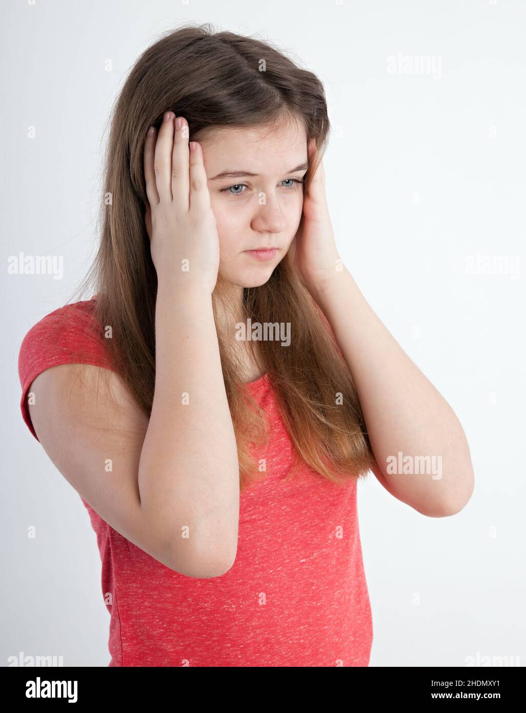 girl, headaches, sensitive to noise, girls, headache, sensitive to noises Stock Photo Alamy