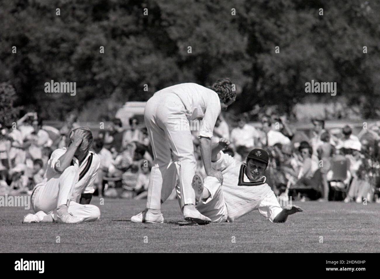 Peter Lever and Jack Simmons (Lancs) playing around at a break in play, Northamptonshire v Lancashire, John Player League, Manor Fields, Bletchley, Milton Keynes, Buckinghamshire, England 22 August 1976 Stock Photo