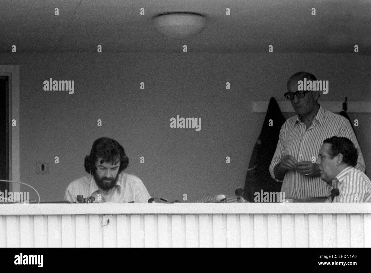 BBC radio commentators, left to right, Bill Frindall (statistician), Brian Johnston and Trevor Bailey. In the commentary box at the England vs West Indies Test Match, Trent Bridge Cricket Ground, Nottingham, England 3-8 June 1976 Stock Photo