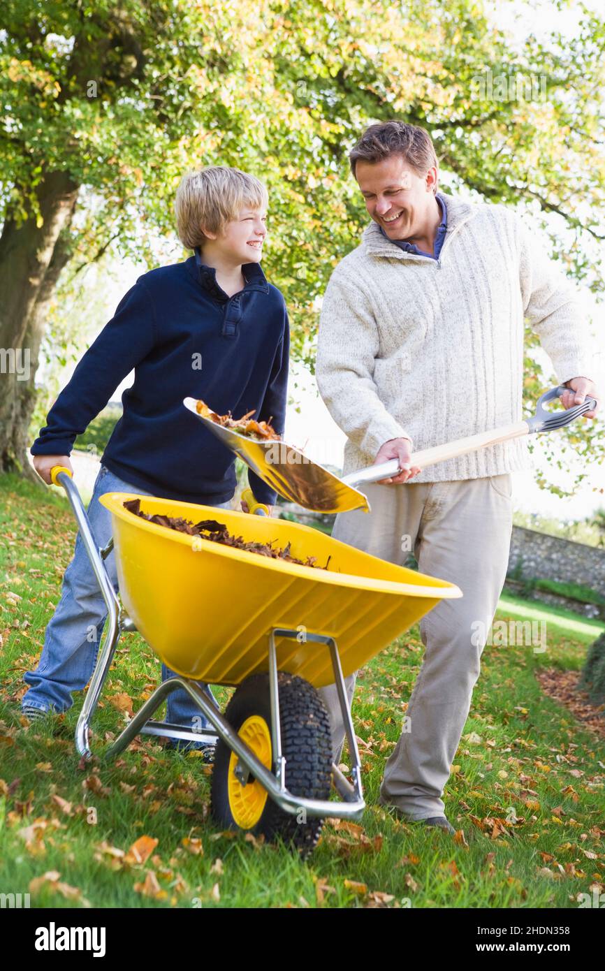 father, gardening, son, dad, fathers, plant care, tending of plants, sons Stock Photo