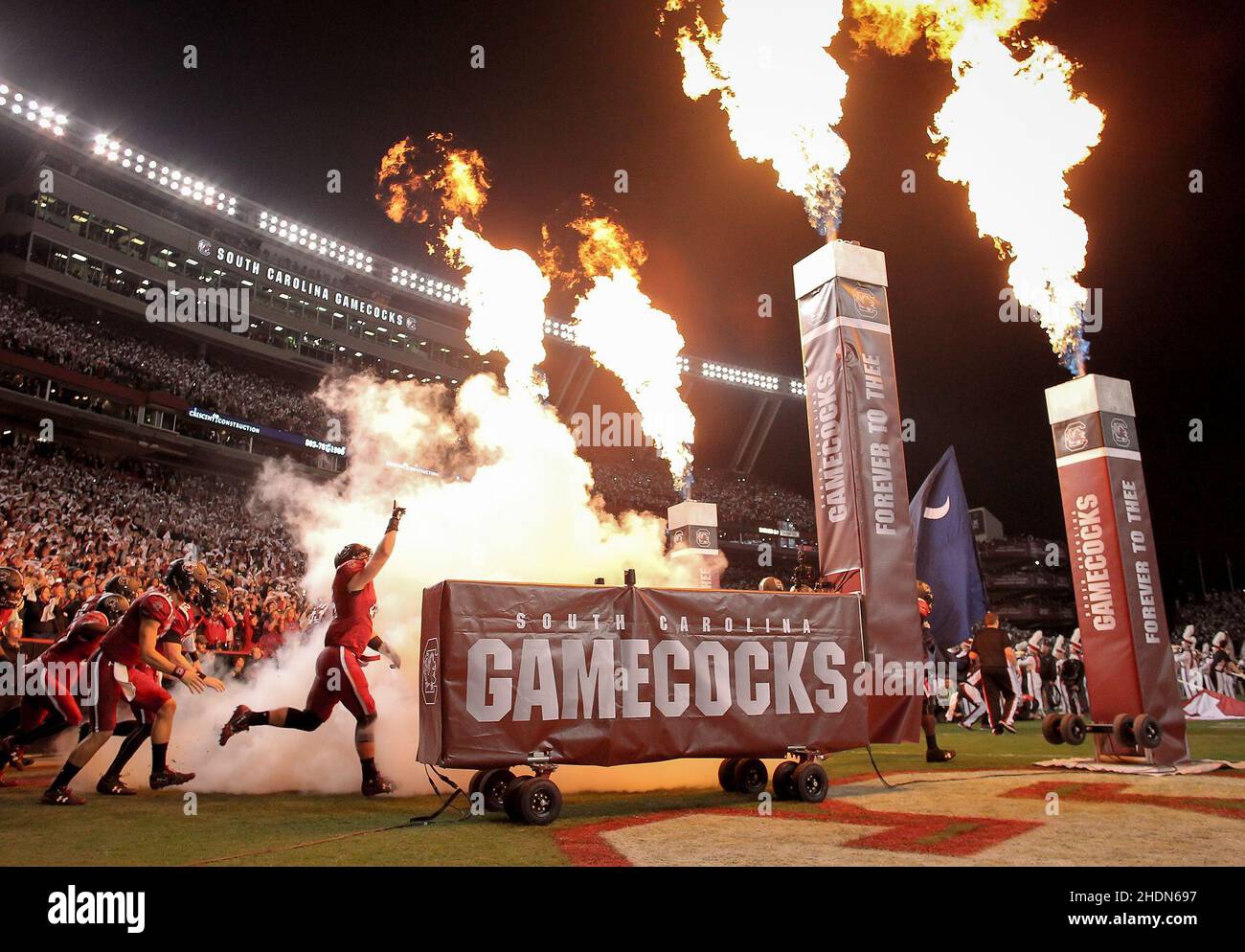 The South Carolina Gamecocks team enters Williams-Brice Stadium through flames to the playing of  2001 before the start of their SEC college football game in Columbia, S.C. (Travis Bell/SIDELINE CAROLINA) Stock Photo
