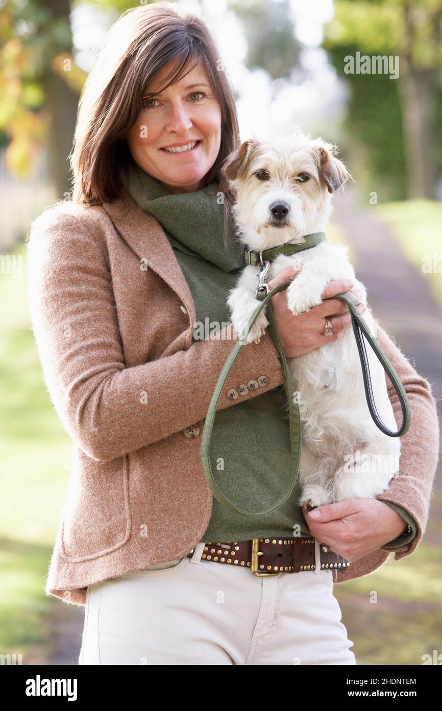 woman, walk the dog, dogs husbandry, dog owner, female, ladies, lady,  women, walk the dogs, dogs husbandries, dog owners Stock Photo - Alamy