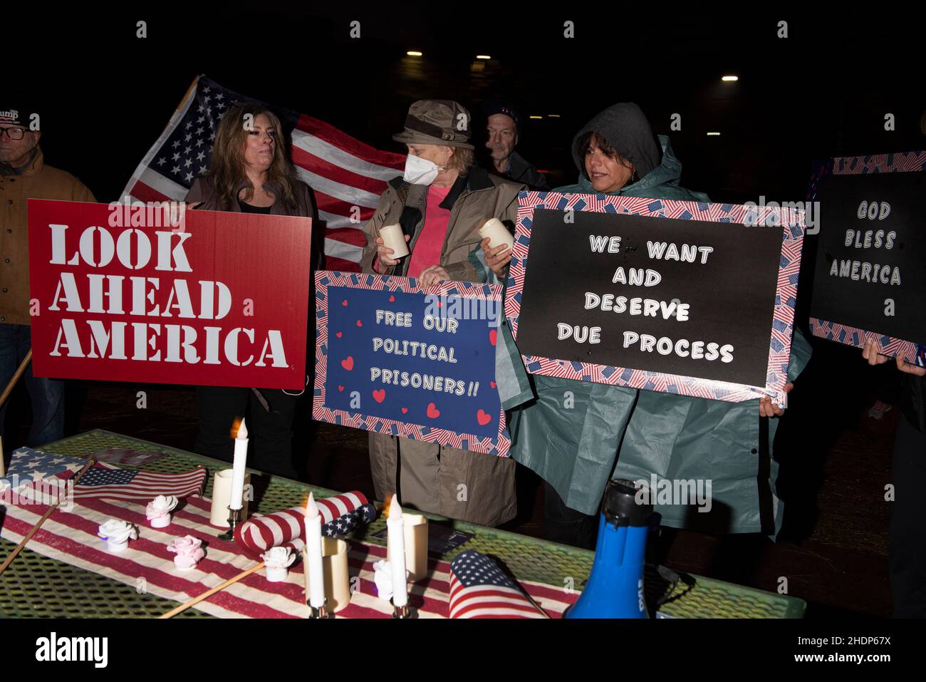 Woodstock, GA, USA. 6th Jan, 2022. Georgia Republican supporters of Former President Donald Trump gather at a Cherokee County park north of Atlanta for a prayer vigil to honor 'patriots' attending the January 6, 2021 protest at the U.S. Capitol. The vigil was organized by Look Ahead America group, with candlelight vigils all across the country to honor the political prisoners and all those who've been politically persecuted in the aftermath of the January 6th protests, and to also commemorate the deaths of Ashli Babbitt and Rosanne Boyland. (Credit Image: © Robin Rayne/ZUMA Press Wire) Credit: Stock Photo
