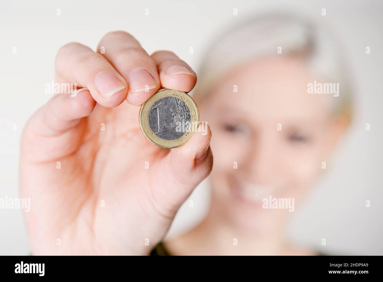 young woman, save, coin, 1 euro, girl, girls, woman, young women, saves, coins, one euro Stock Photo