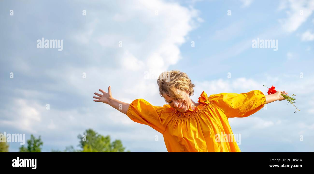 Happy lady outstretched arms hi-res stock photography and images - Alamy