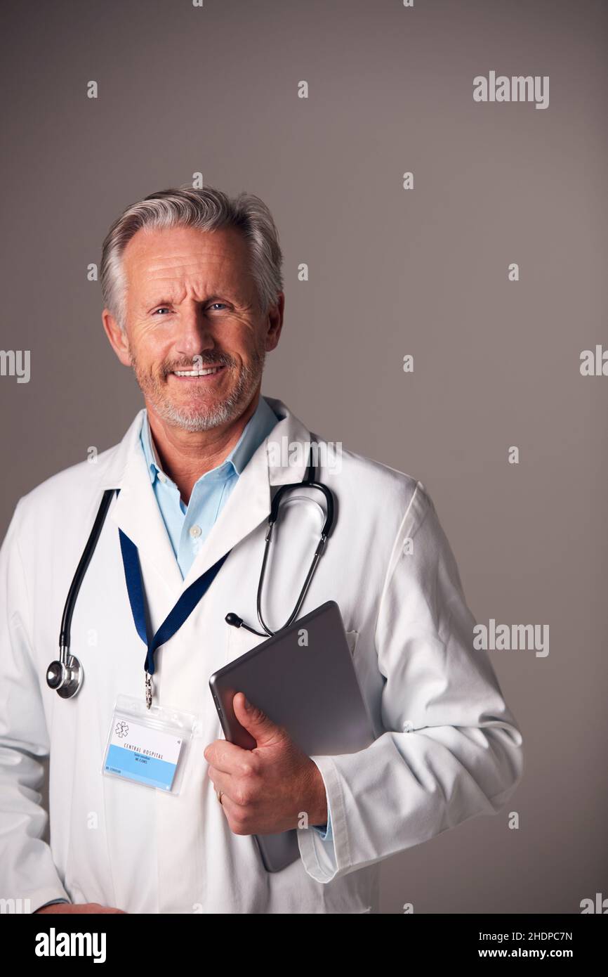 Portraits smiling male doctor hi-res stock photography and images - Alamy