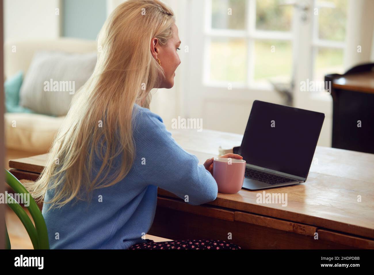 Relaxed Computer User Relaxed person on computer hi-res stock photography and images - Alamy
