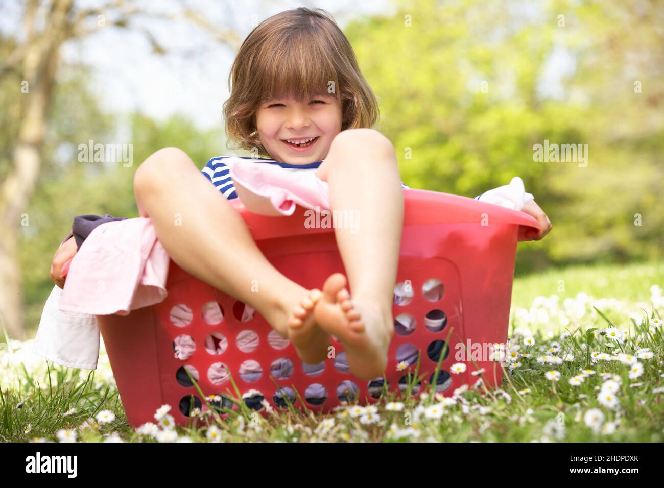boy, laundry basket, boys, laundry baskets Stock Photo - Alamy
