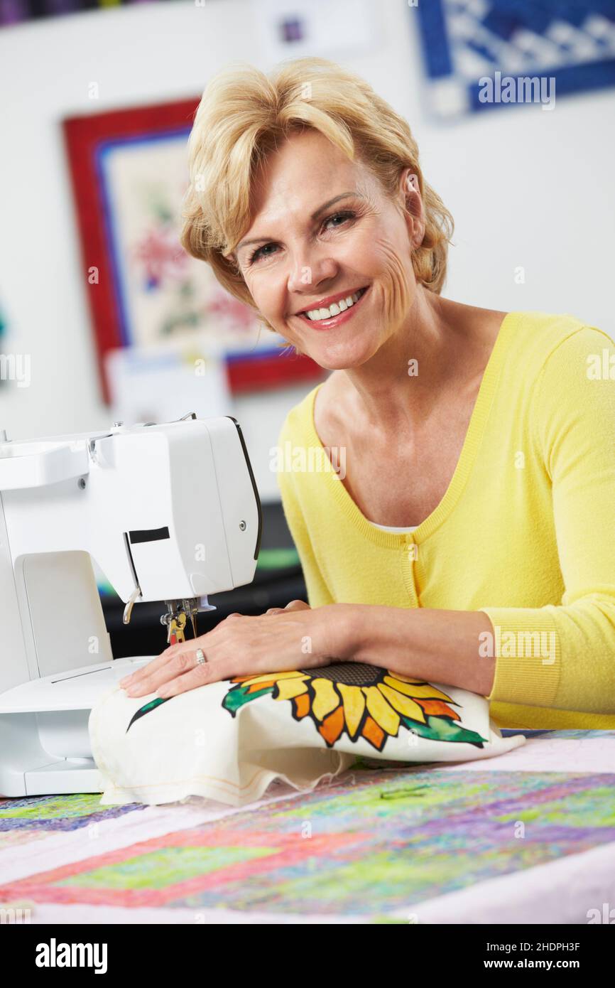 Young women at the Life & Hope Sewing School in Siem Reap, a community  project teaching disadvantaged women small business skills, Cambodia Stock  Photo - Alamy