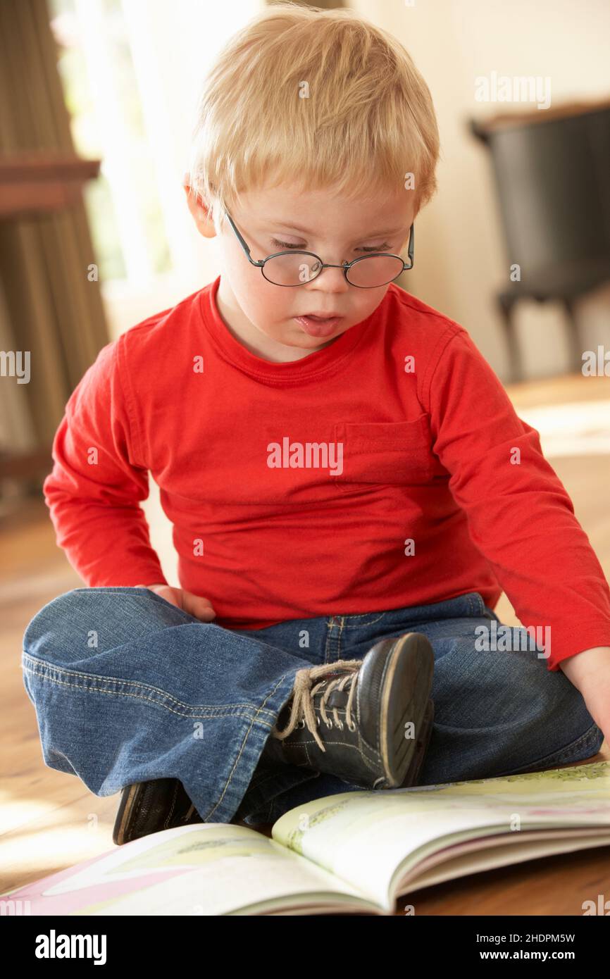 boy, picture book, Down syndrome, boys, picture books Stock Photo Alamy