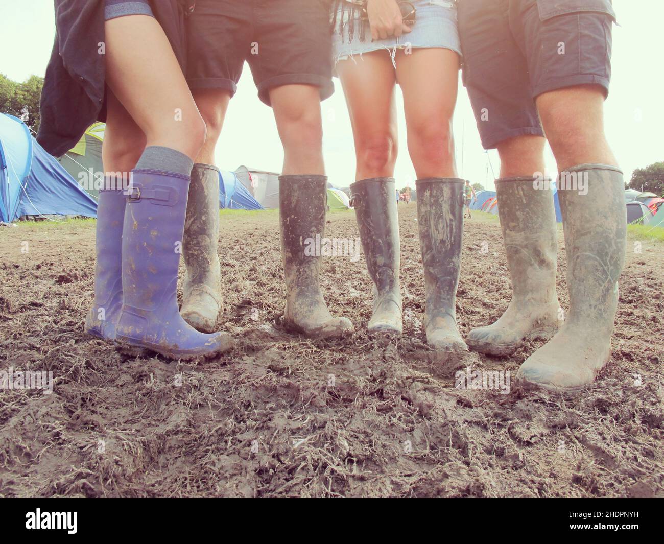 mud, galoshes, festival goer, muds, wellies, wellington boots, welly Stock Photo