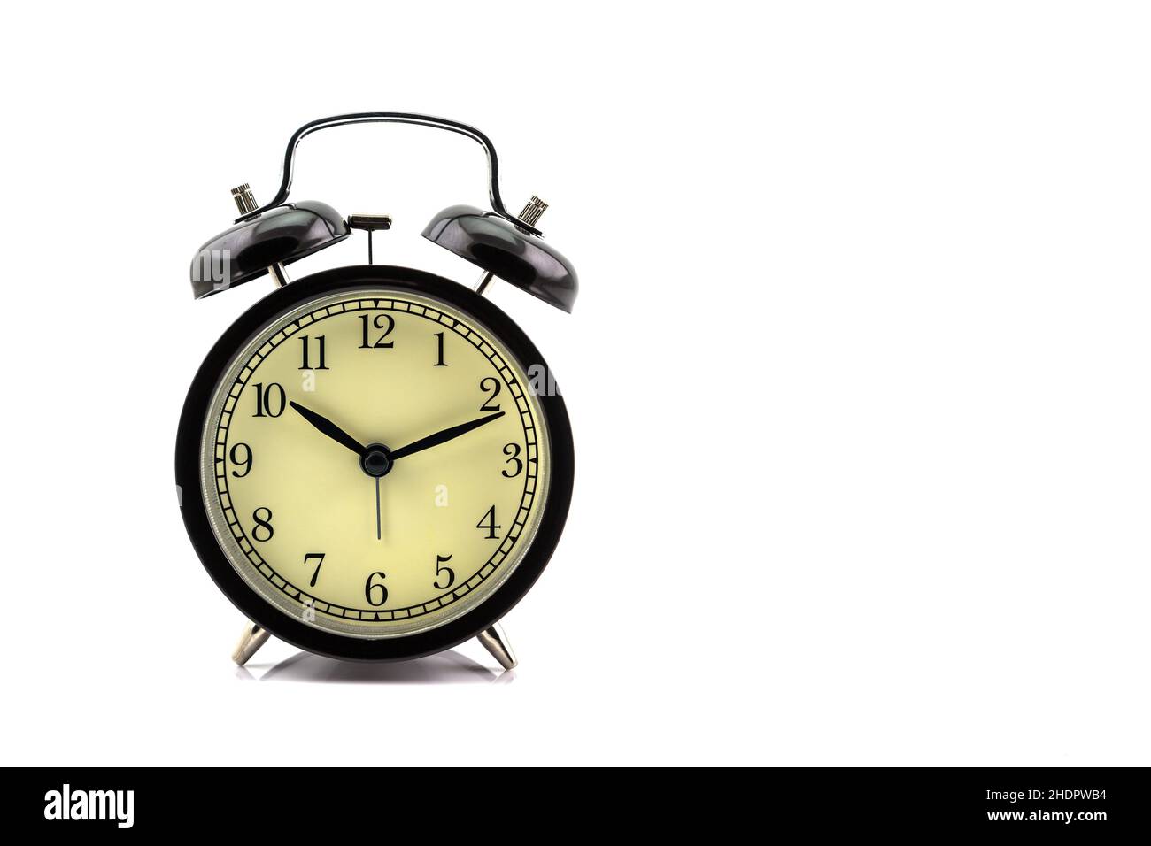 Retro alarm clock isolated on white background Stock Photo