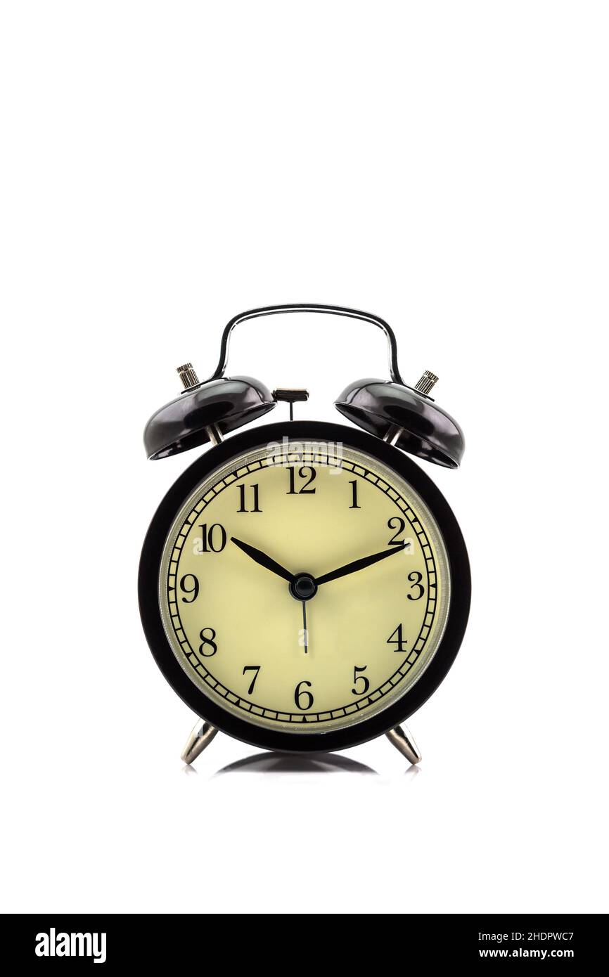 Retro alarm clock isolated on white background Stock Photo - Alamy