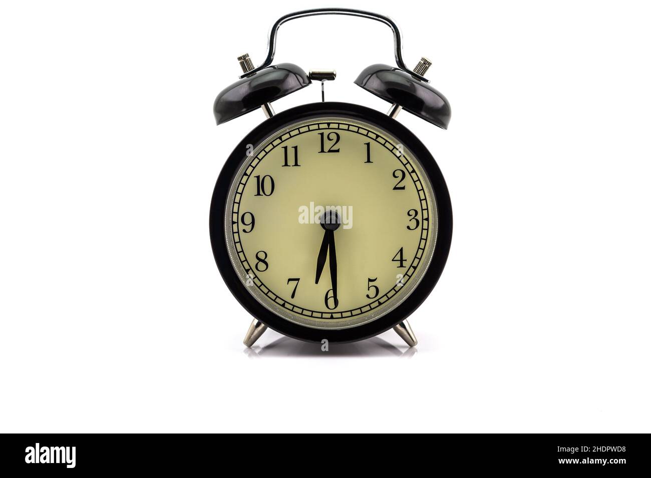 Retro alarm clock isolated on white background Stock Photo - Alamy