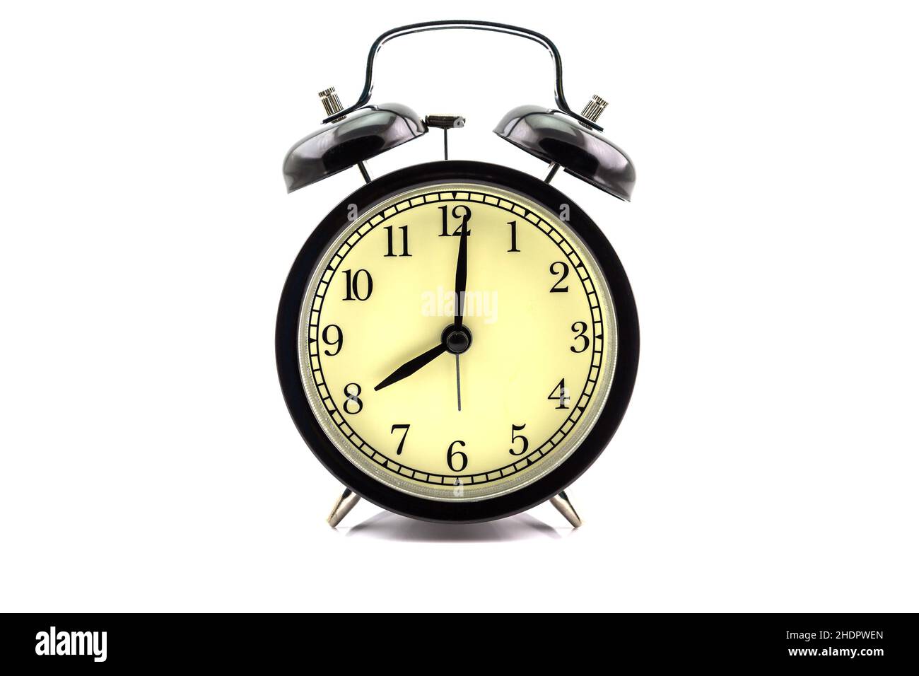 Retro alarm clock isolated on white background Stock Photo - Alamy