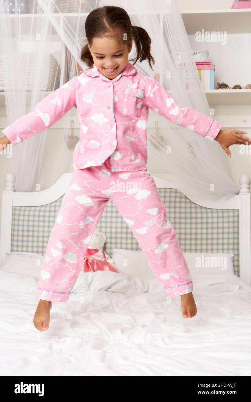 girl, jump, pajama, nursery, girls, jumper, jumping, jumps, pajamas, pyjama,  nurseries Stock Photo - Alamy
