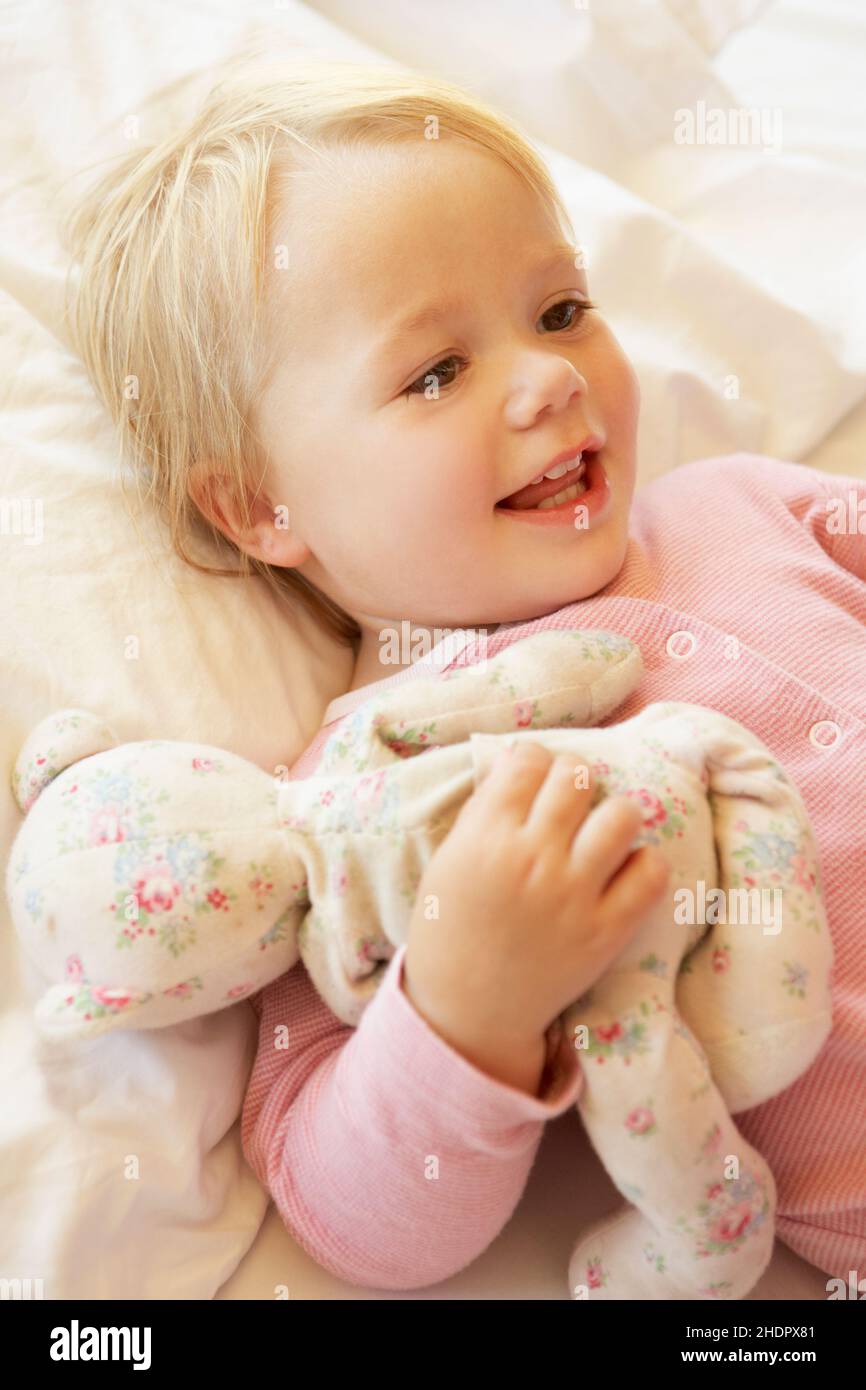 toddler, girl, soft toy, infant, infants, toddlers, girls, soft toys Stock Photo