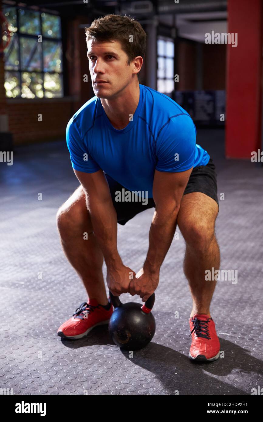 Man using kettlebell hires stock photography and images Alamy