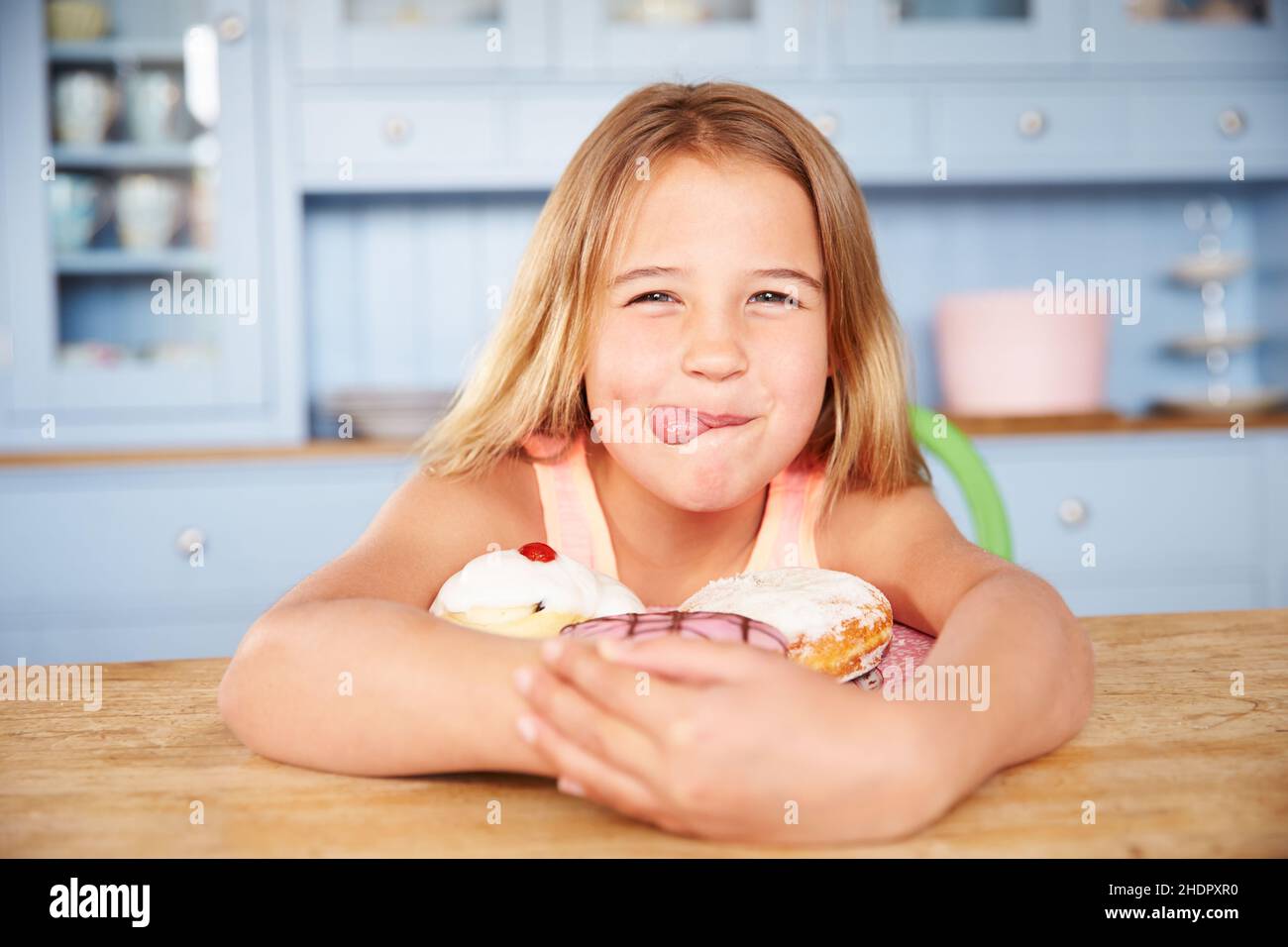 girl, sticking out tongue, sweet food, pie, girls, poking tongues, sticking out tongues, sweet foods, cake, pies Stock Photo