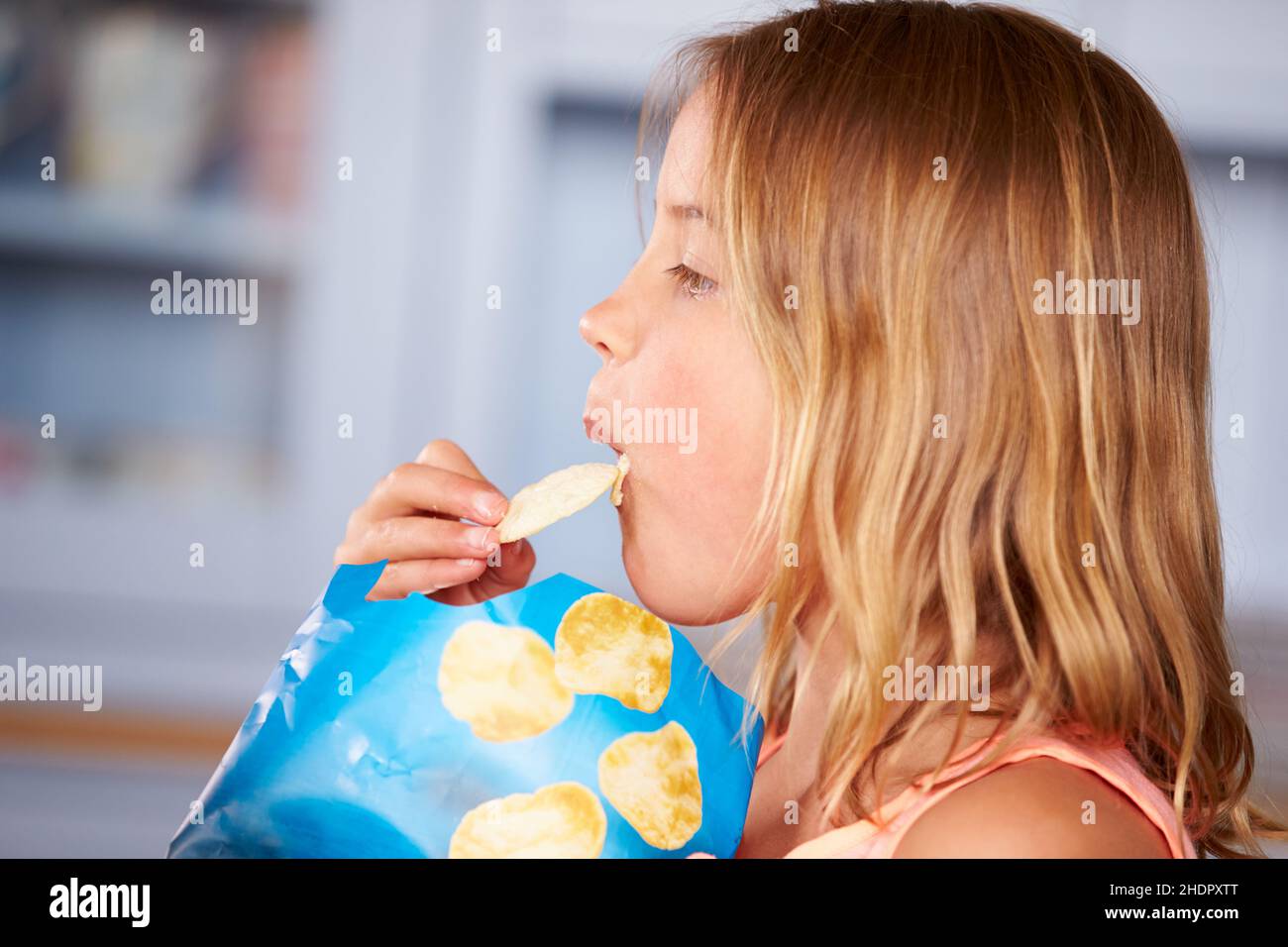 girl, unhealthy, potato chips, girls, unhealthies, potato chip Stock Photo