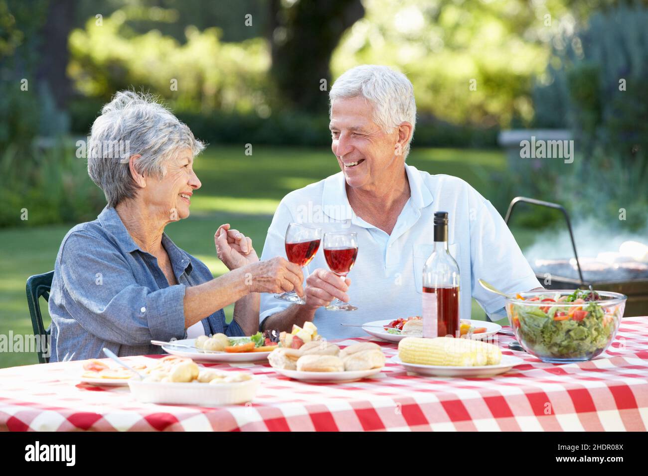 Senior couples drinking wine looking hires stock photography and