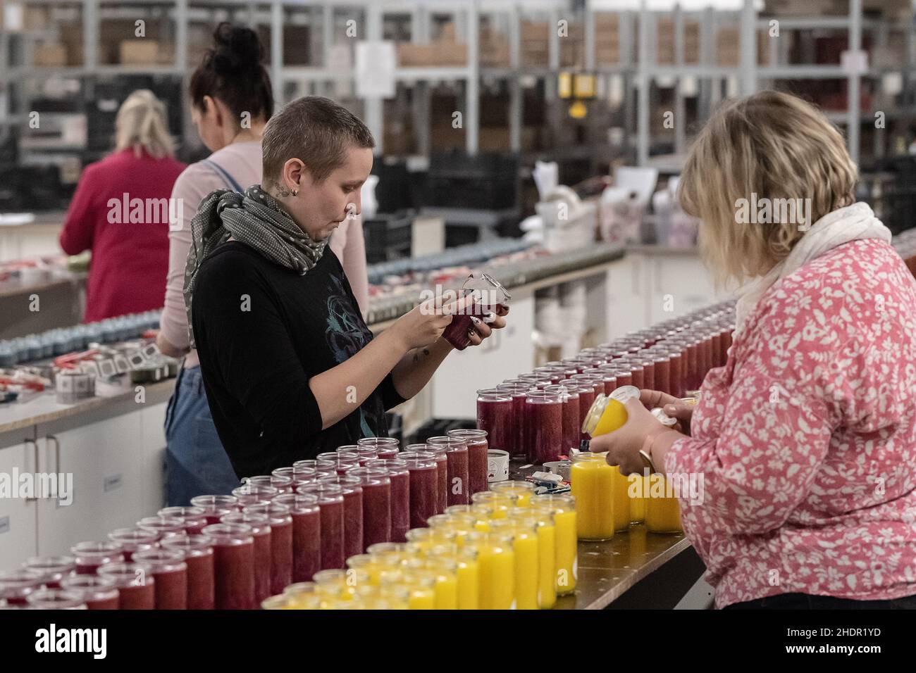 https://c8.alamy.com/comp/2HDR1YD/production-07-december-2021-lower-saxony-nesselrden-female-employees-label-candle-jars-at-the-candle-factory-candle-factory-has-been-producing-candles-from-sustainably-grown-stearin-in-eichsfeld-near-duderstadt-since-2006-photo-swen-pfrtnerdpa-2HDR1YD.jpg