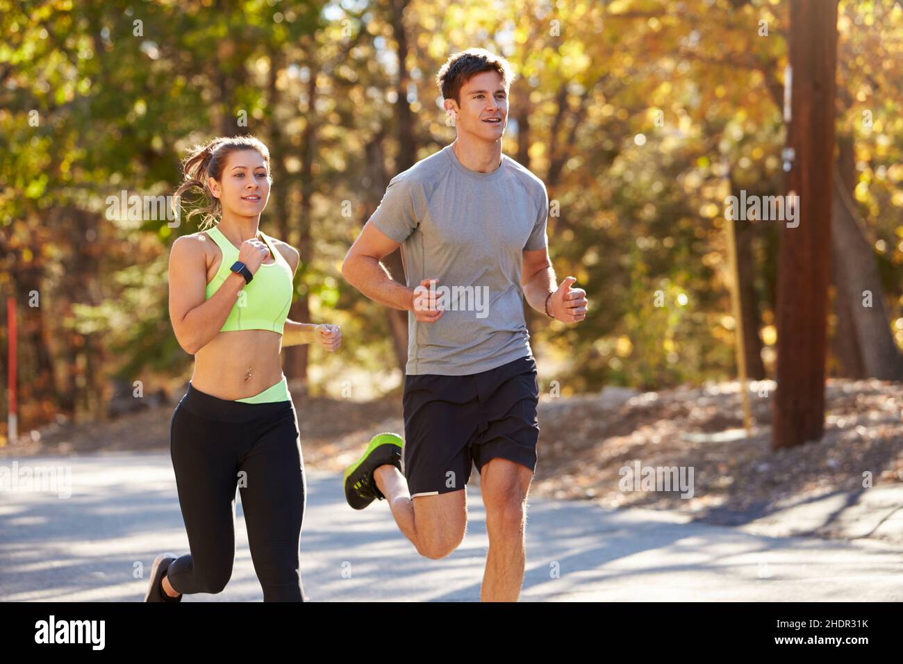 Adult Adults Man Male Woman Female Couple Jogger Runner Runners Hi Res