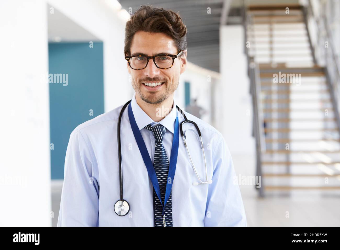 Portrait young positive doctor hi-res stock photography and images - Alamy