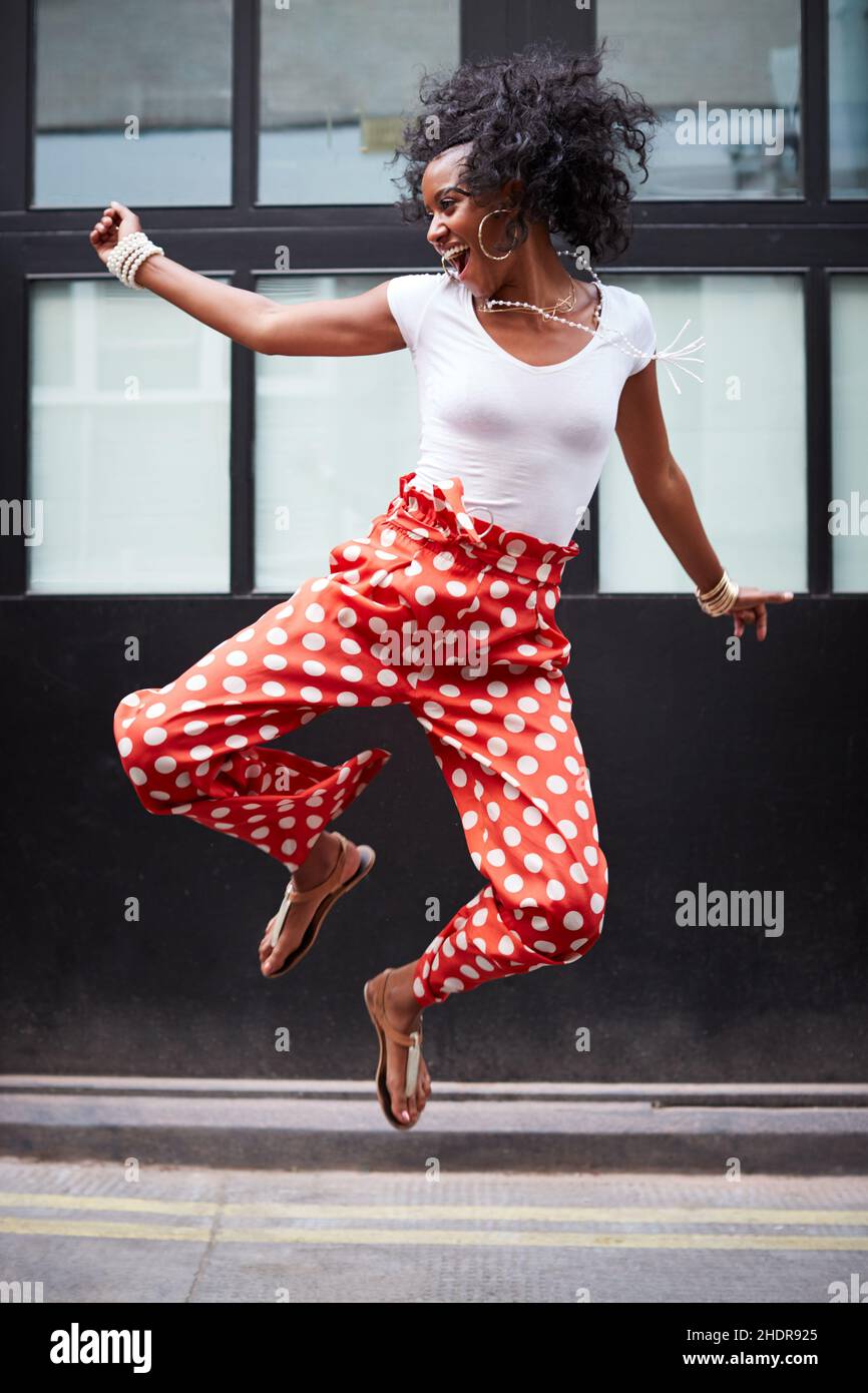 vitality, jumping, Afro-american, fun, living, jump, jumper Stock Photo