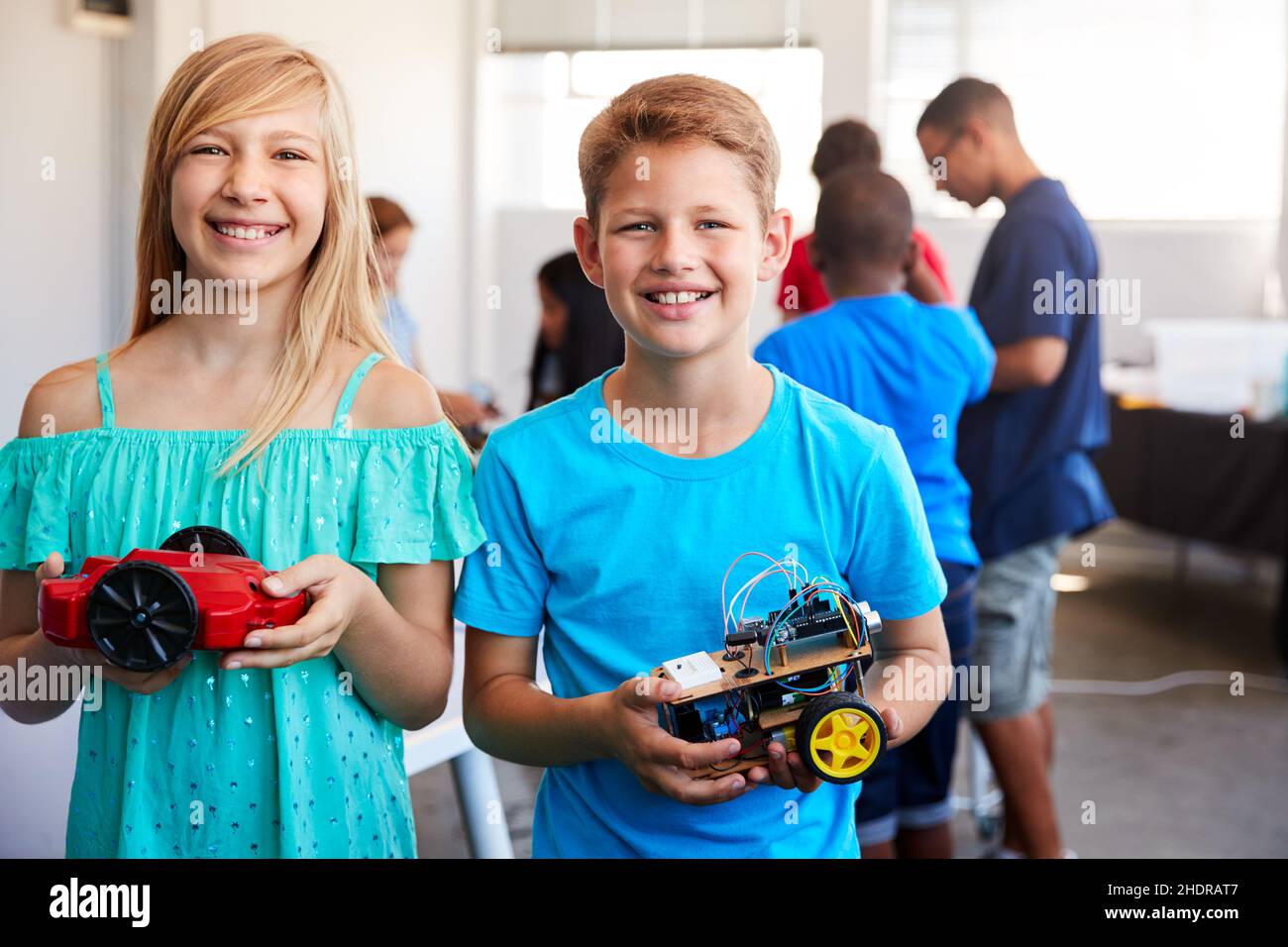 holding, pupils, robot, school childrens, robots Stock Photo