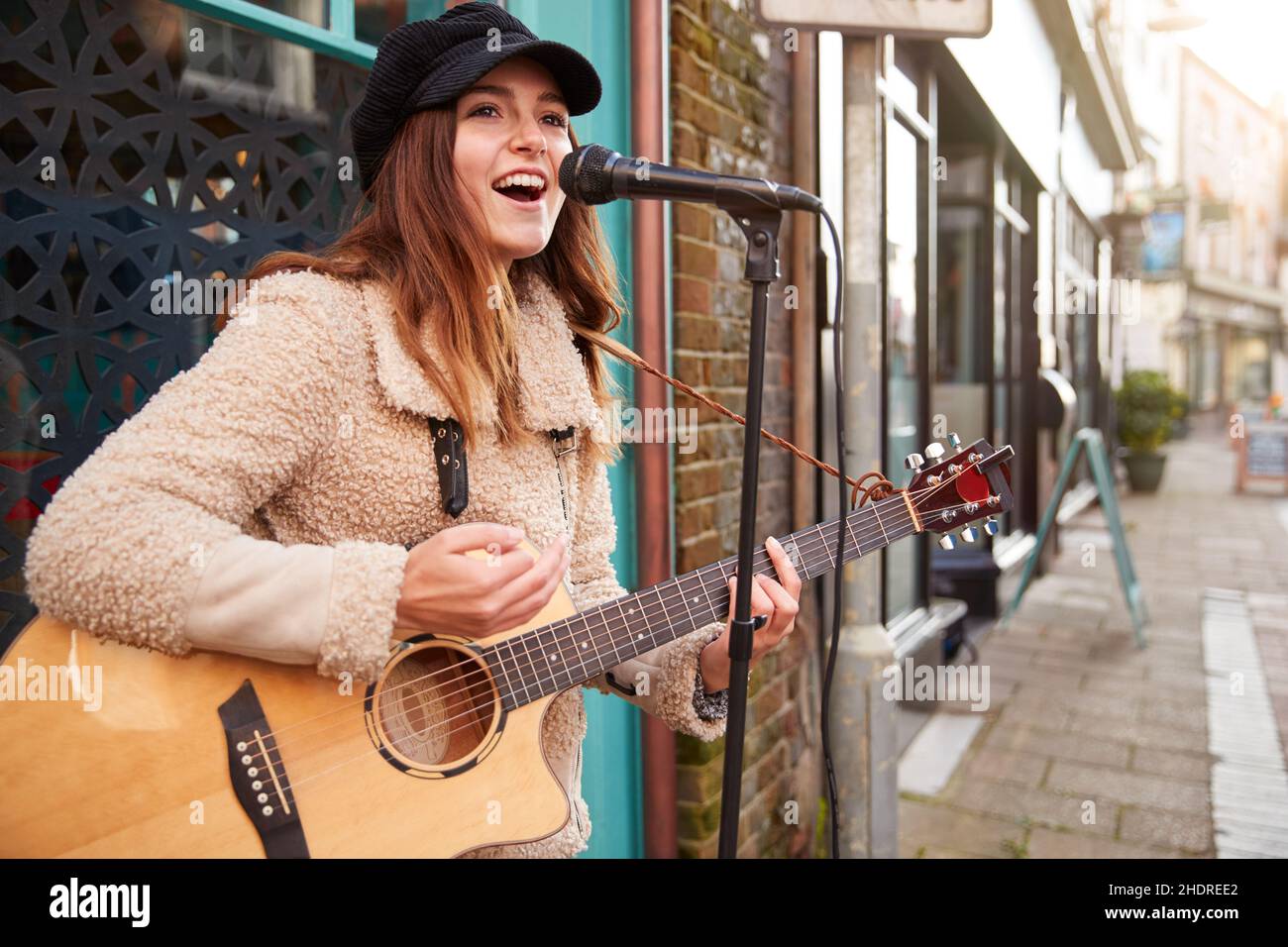 street busker, playing guitar, buskers, playing guitars Stock Photo Alamy