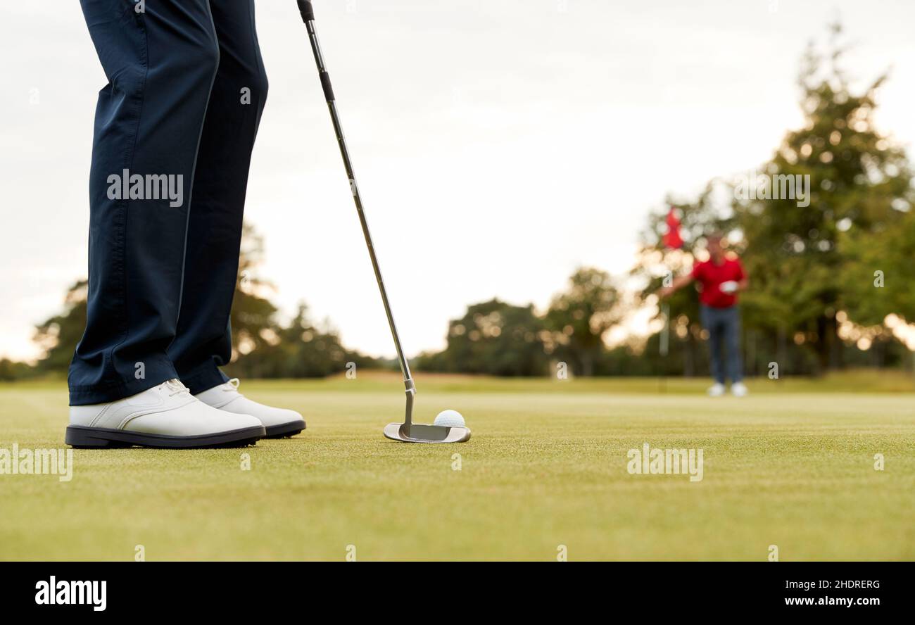 Putting Ball putting, golf ball, golf balls Stock Photo - Alamy