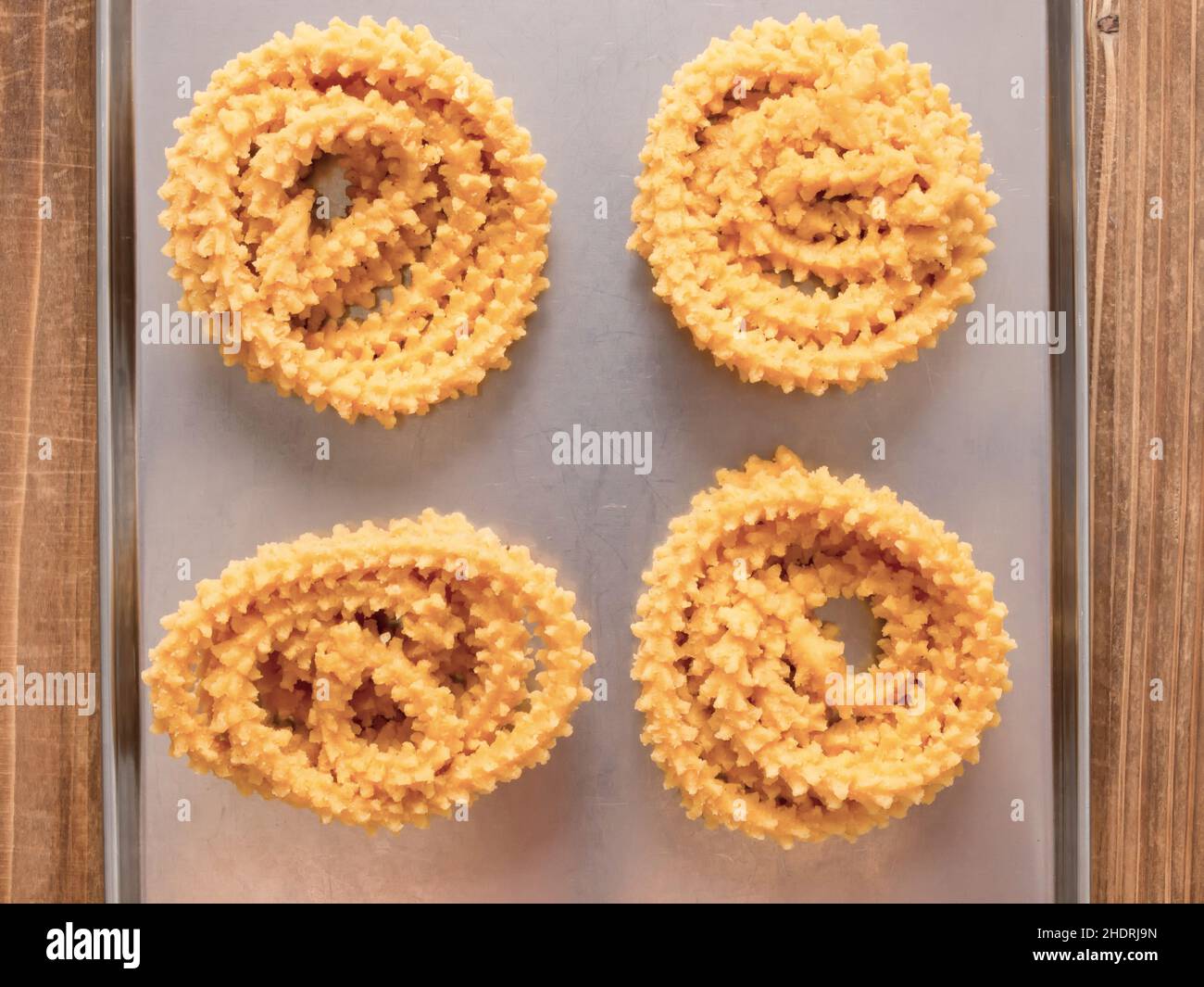 baking sheet, spray pastries, murukku, baking sheets Stock Photo Alamy