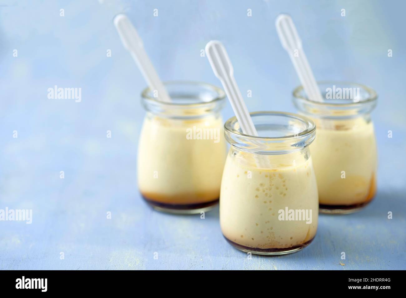 vanilla pudding, caramel sauce, vanilla mousse, caramel sauces Stock Photo Alamy
