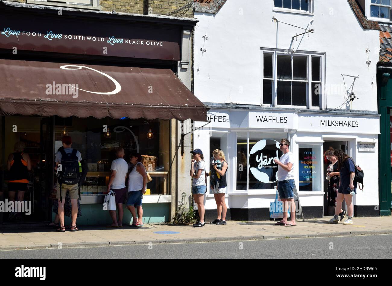 people queuing at the black olive bakery, delicatessen, high street